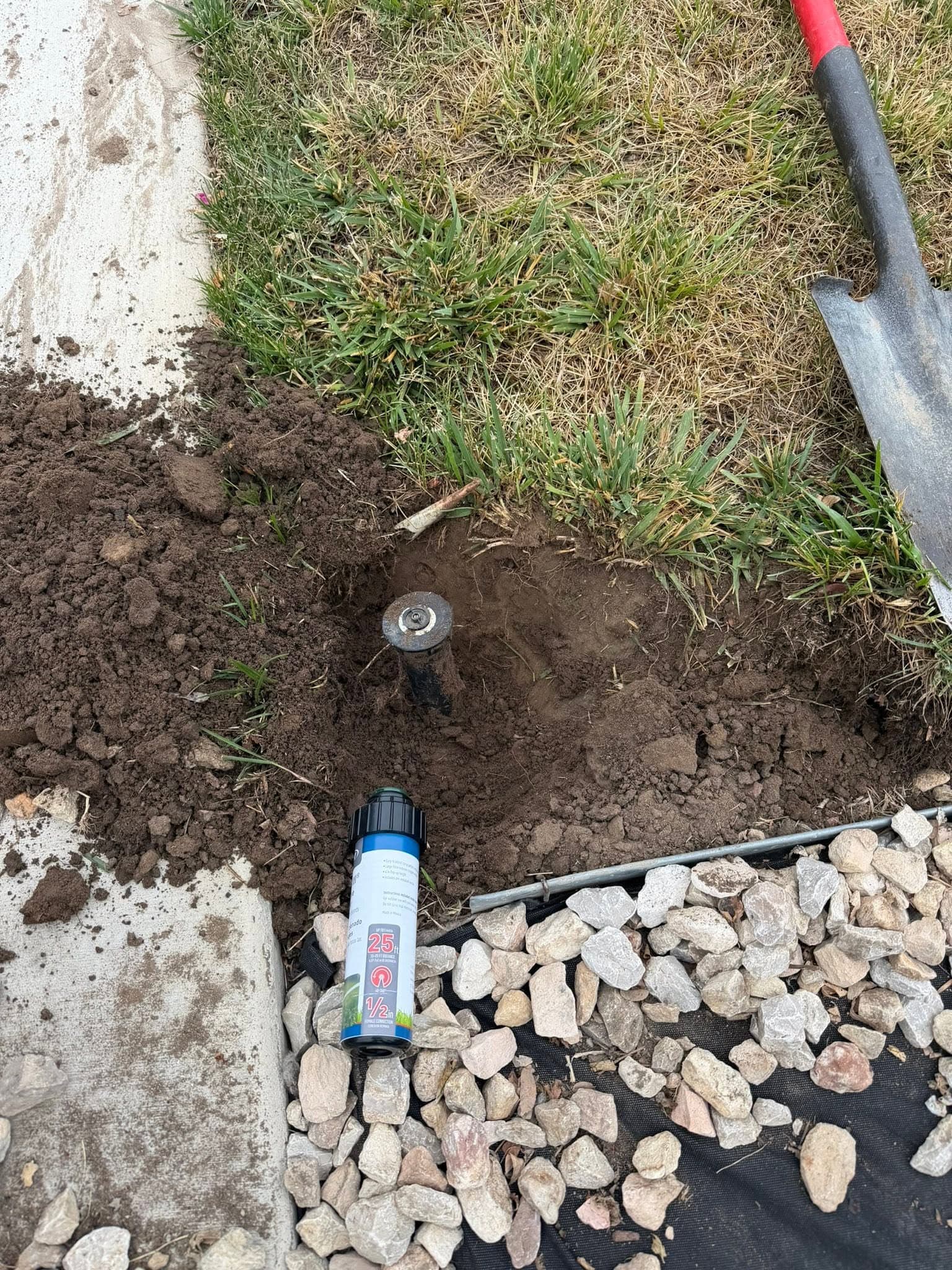 Irrigation valve installation with trenching and gravel base